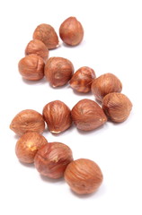 Heap of hazelnut on white background