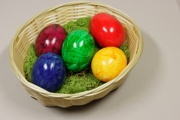 colorful easter eggs in a basket