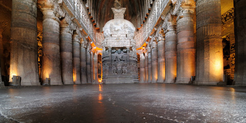 View inside of ancient Buddhist rock temple in Ajanta
