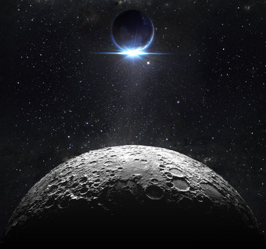 Fototapeta moon surface with view sunrise of the earth