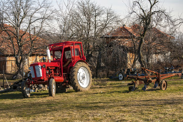 View from a mountain farm with tractor on meadow
