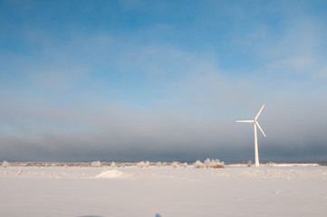 Windmill and blue sky in winter