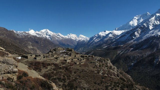 Old village and high mountains of the Annapurna Range