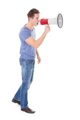 Young Man Shouting Through Megaphone