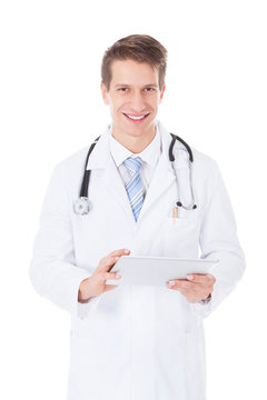 Male Doctor Using Digital Tablet