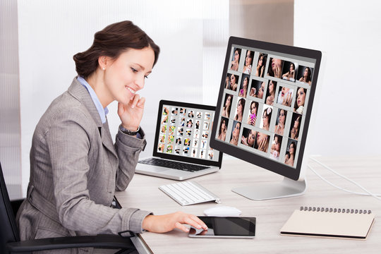 Businesswoman Browsing Pictures