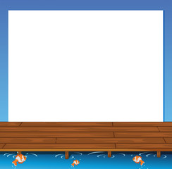 An empty paper template with a wooden bridge and fishes at the b