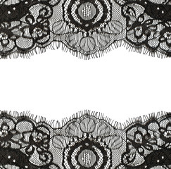 Black lace edges on white background