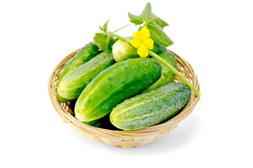 Cucumber with flower in a wicker basket