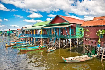 Deurstickers The floating village on the water of Tonle Sap lake. Cambodia. © Aleksandar Todorovic