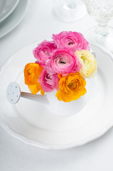 Festive table setting with flowers