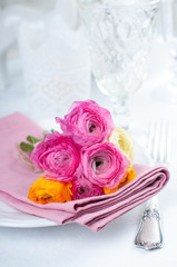 Festive table setting with flowers