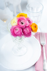 Festive table setting with flowers