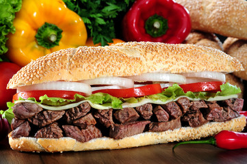 Meat sandwich on parmesan baguette