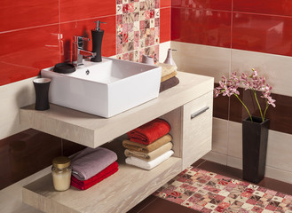 Interior of modern bathroom with sink and toilet