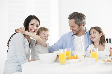 Obraz na płótnie Canvas breakfast for an happy family
