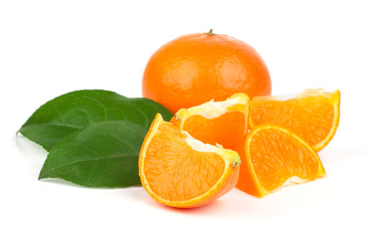 orange mandarins with green leaf isolated on white background..