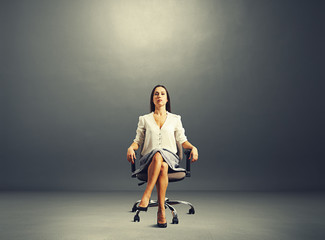 businesswoman sitting on the office chair