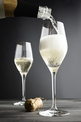 Champagne being filled into Glasses