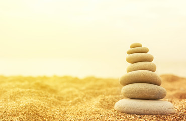 stack of stones in the sand