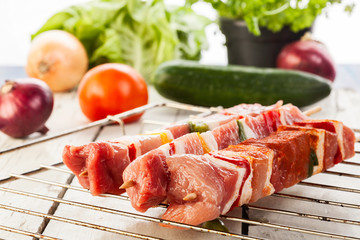 Raw shashlik and vegetables