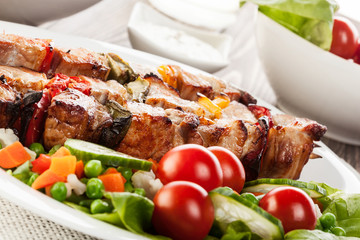 Grilled shashlik with vegetables