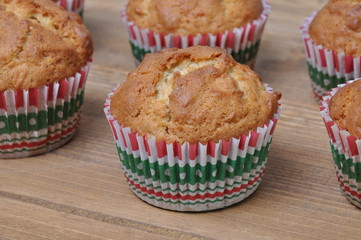 Muffins on wooden board in the kitchen