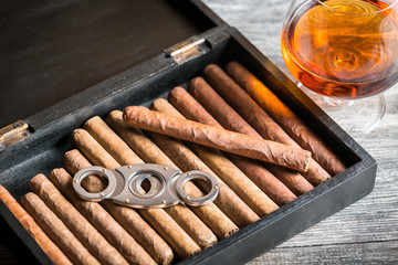 Wooden humidor full of cigars