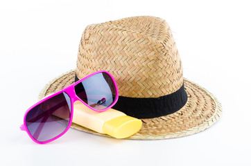 Hat , sunglasses , body lotion isolated on white background