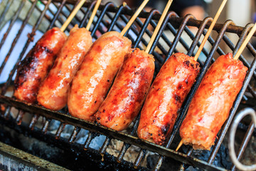 Grilled sausage that has pork and rice inside