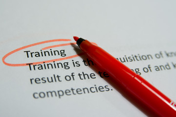 Obraz premium training circled text with red pen