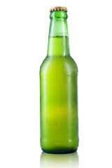 Bottle of beer with drops isolated