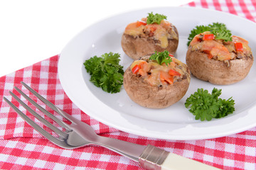 Stuffed mushrooms on plate on table close-up