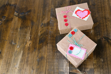 Paper gift boxes on wooden background
