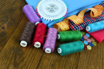 Sewing accessories on wooden table