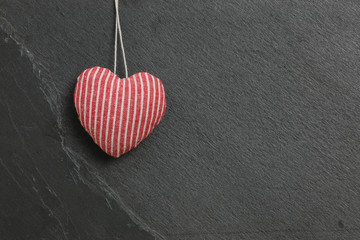 Red with White stripes Love Valentine's heart hanging on grey sl