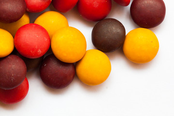 Close up of a pile of colorful chocolate coated candy