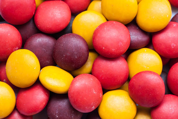 Close up of a pile of colorful chocolate coated candy