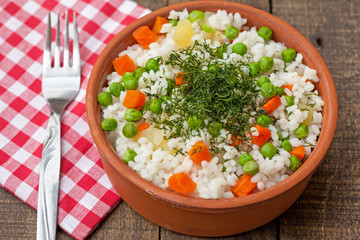 rice with dill, peas and carrot