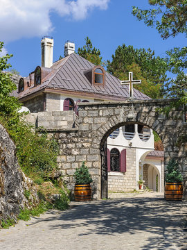 picturesque house with a stone gate