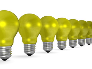 Row of yellow reflective light bulbs in perspective