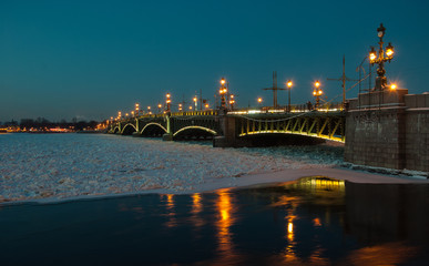 Trinity Bridge in night lights in  winter St. Petersburg
