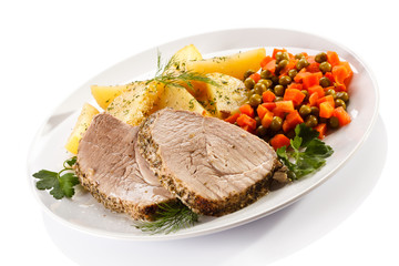 Roast pork, potatoes and vegetable salad