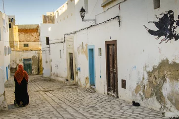 Abwaschbare Fototapete Tunesien Frau in Medina, Sousse, Tunesien