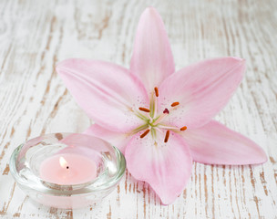 Fototapeta na wymiar lily flower and candle
