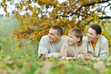 Fototapeta premium Happy family in the autumn park