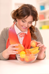 Young woman with fruits