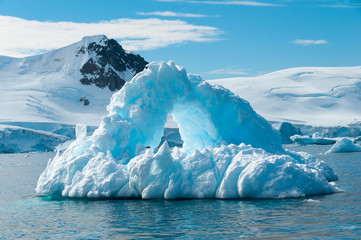 Arch shaped iceberg Antarctica