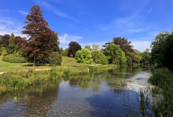 Fototapeta na wymiar Riverbank .Blenheim Palace, England, United Kingdom