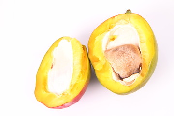 Mango fruit cut in half
